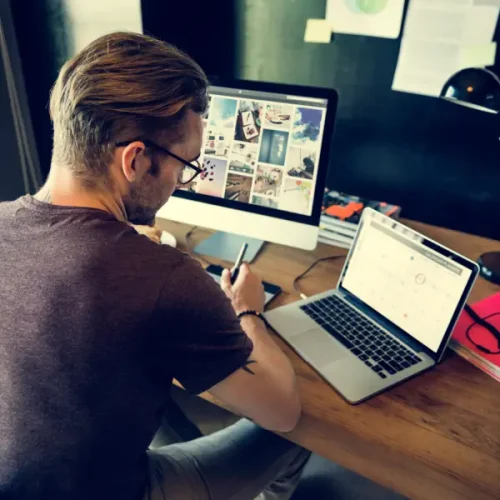 man-busy-photographer-editing-home-office-concept-2025-02-10-12-39-43-utc.webp